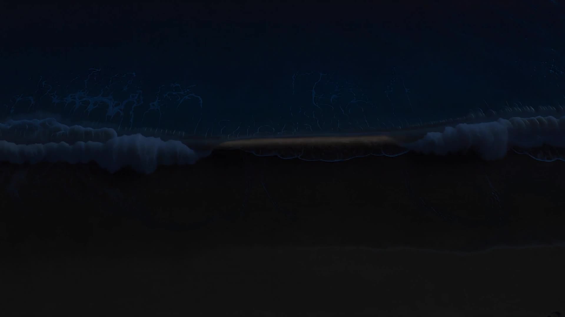 Top-down aerial of waves breaking on sand (night)