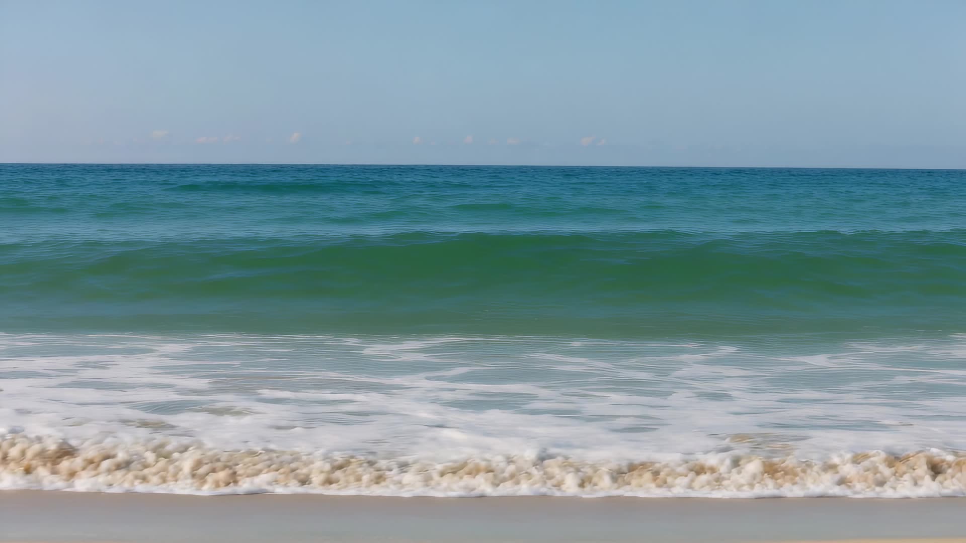 Rolling waves toward shore, eye level