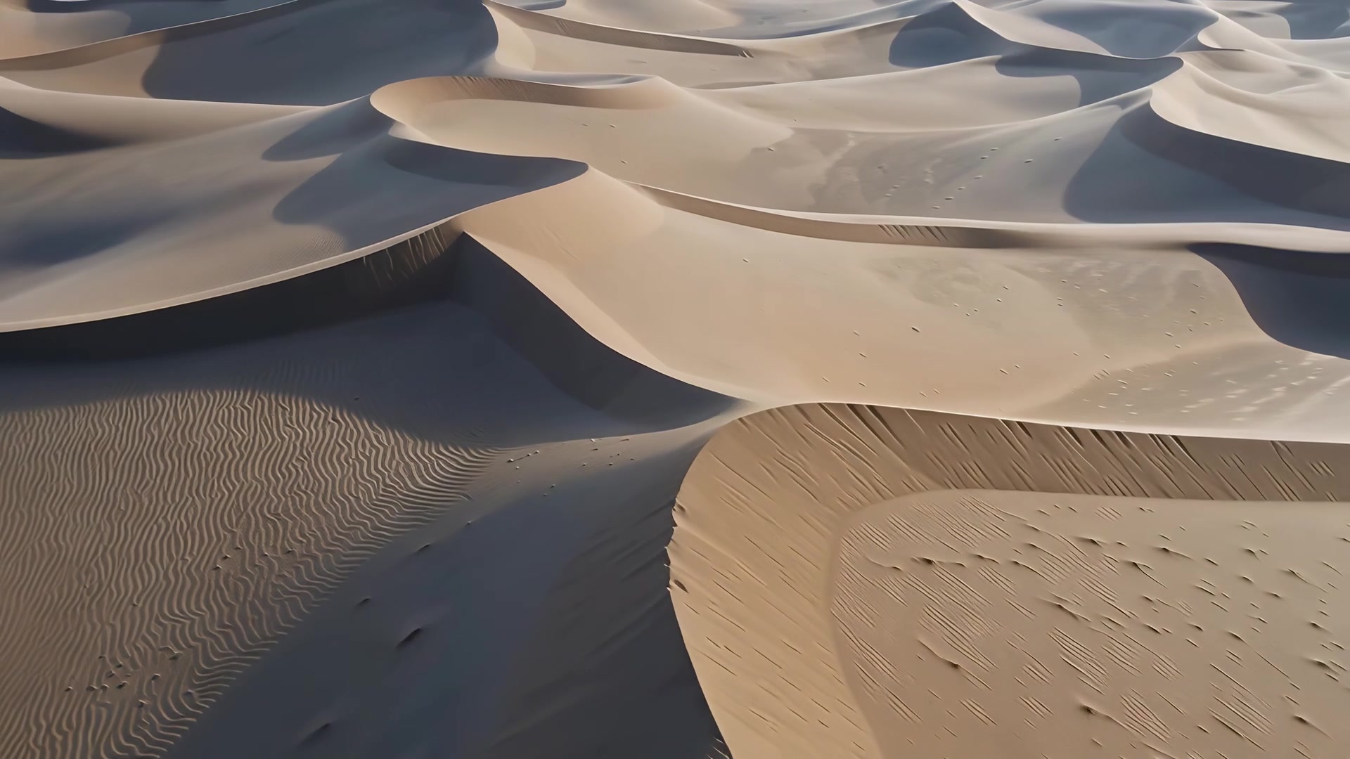 Aerial over dunes, long shadows, day version