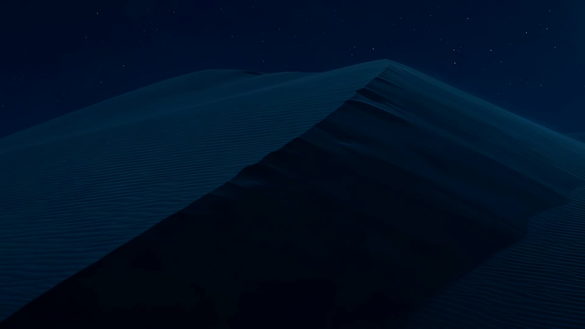 Wind lifting sand off a dune ridge (night)