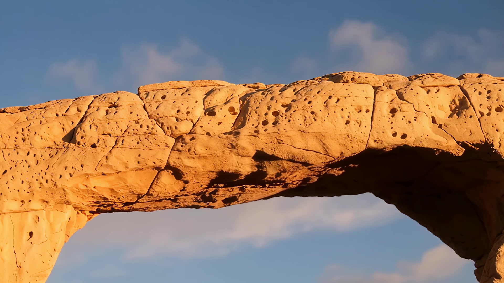 Rock arch against open sky (sunset)