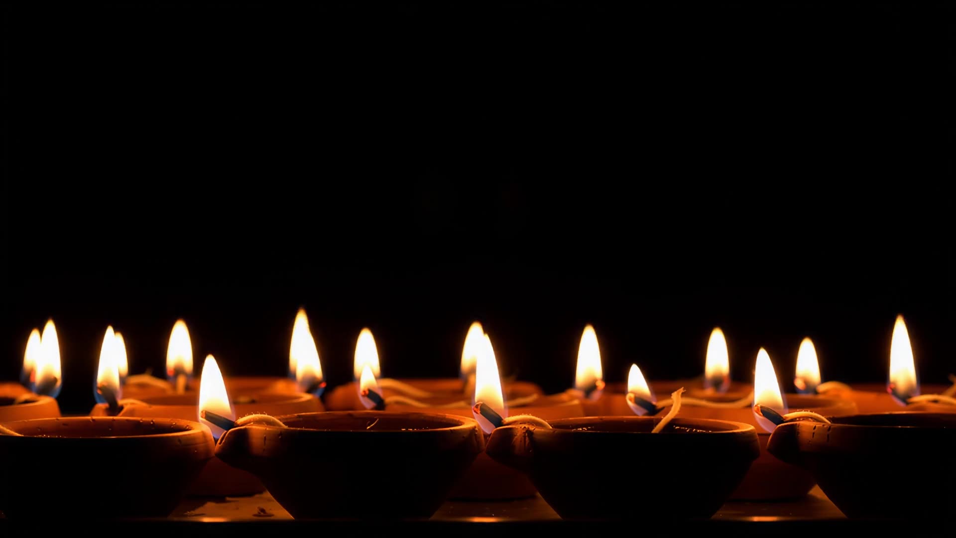 Row of diyas burning