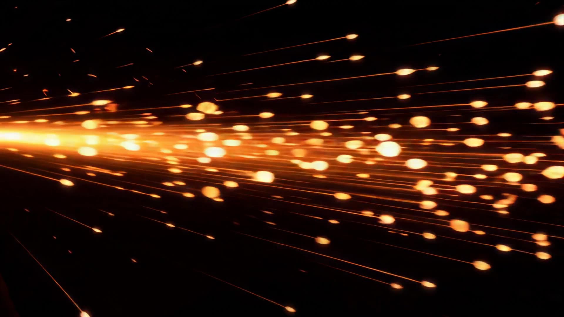 Sparks spraying in from the left
