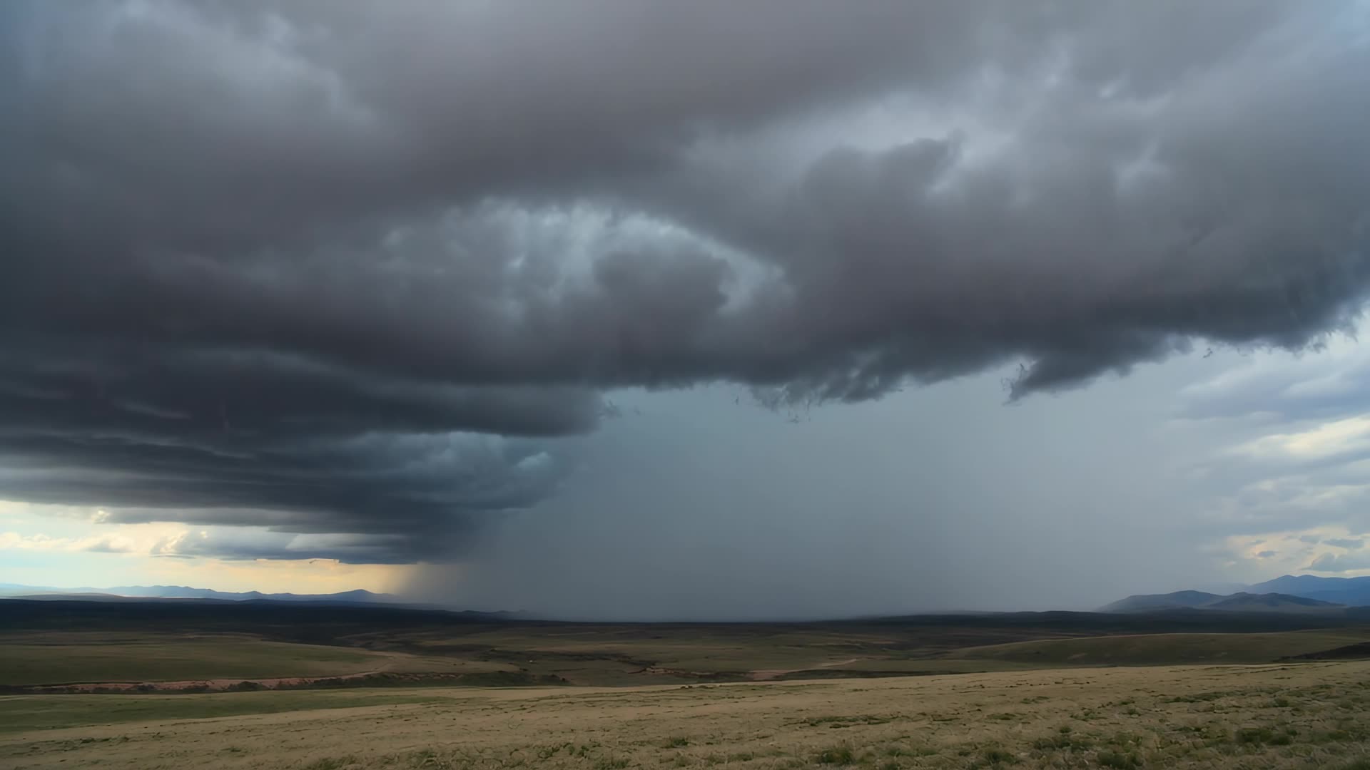 Downpour from dark storm clouds