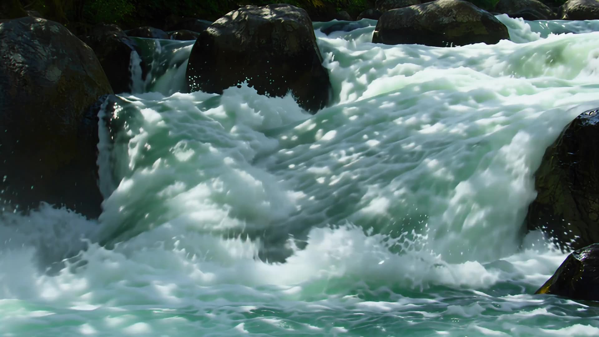 White water over river rocks